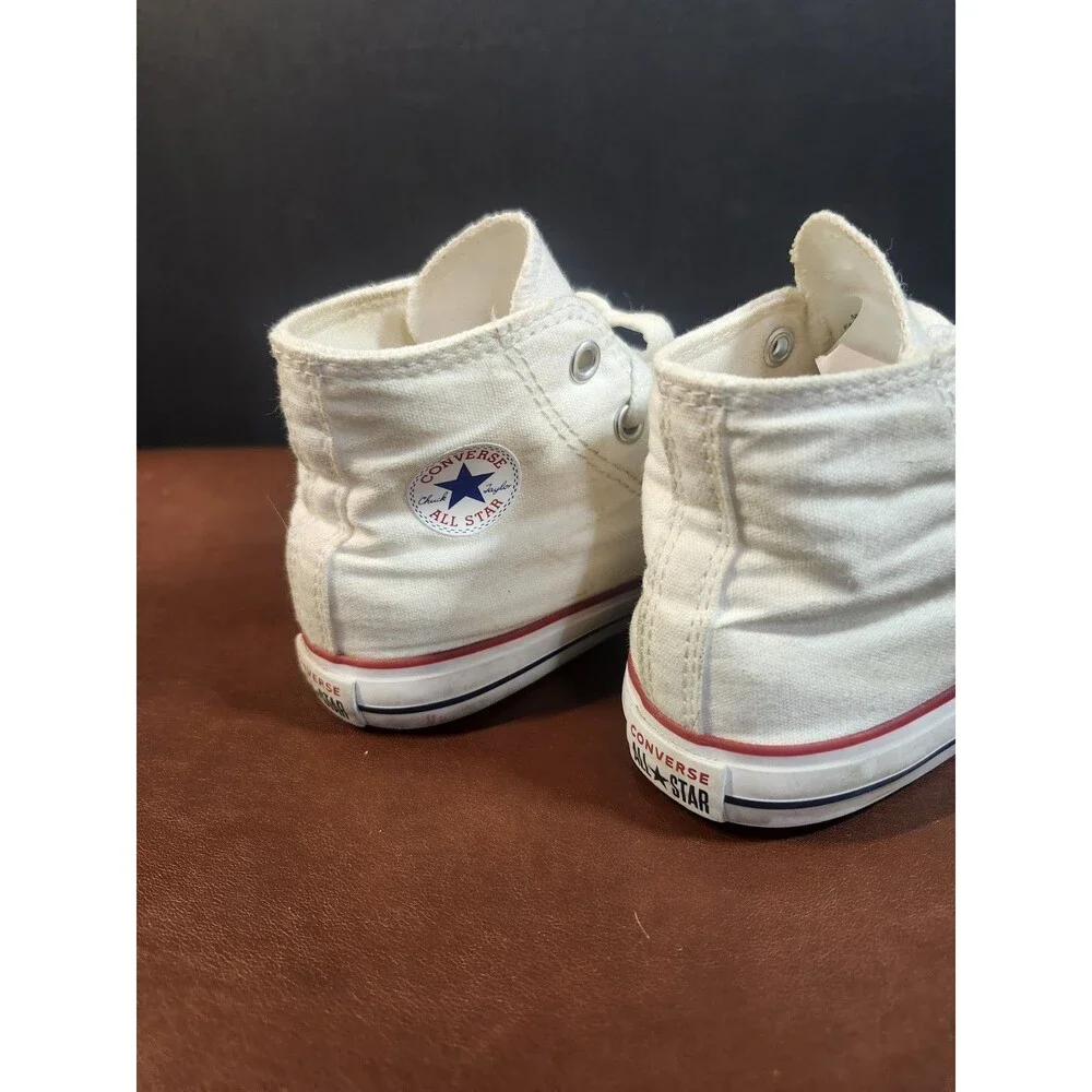 white canvas Converse Chuck Taylor All Star high-top sneakers